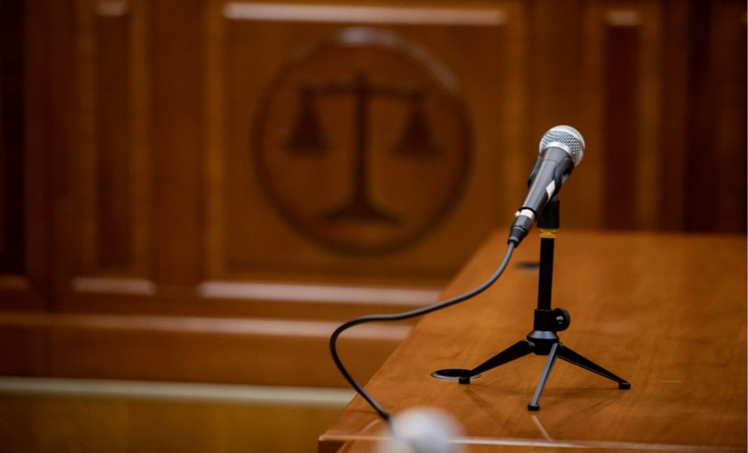 For witnesses Microphone on table in a courtroom